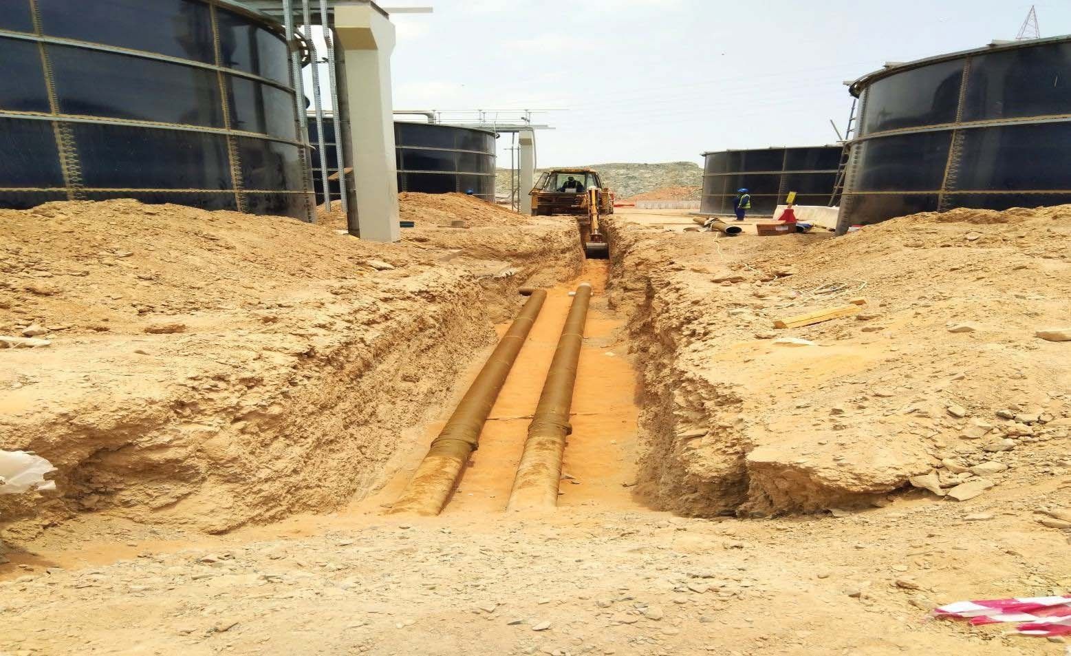 Twin underground pipelines laid in an excavated trench at the Kalba sewage treatment plant